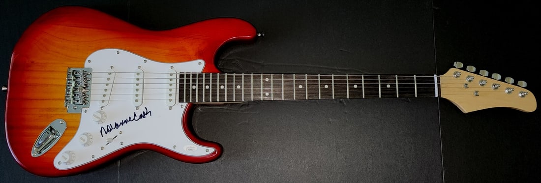Rosanne Cash Signed Electric Guitar Authenticated by JSA: Rosanne Cash Signed Electric Guitar Authenticated by JSA This authentic electric guitar is hand-signed by the talented artist Rosanne Cash. The autograph is verified by James Spence Authentication (JS