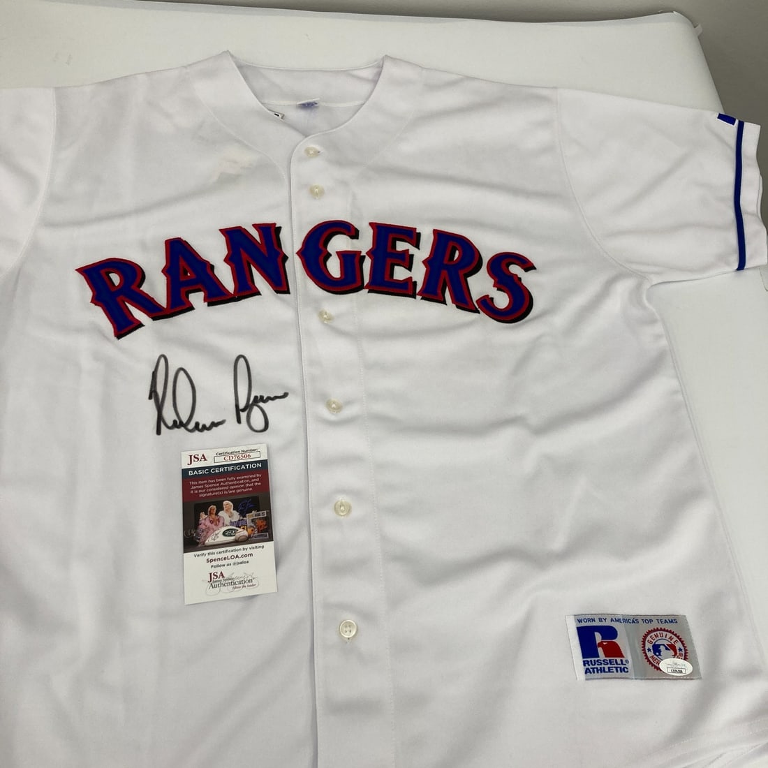 Nolan Ryan Autographed 1990s Texas Rangers Jersey JSA COA: Nolan Ryan Autographed 1990s Texas Rangers Jersey JSA COA This is an original 1990's Russell Texas Rangers game model jersey signed by the legendary baseball player Nolan Ryan. The jersey comes with a