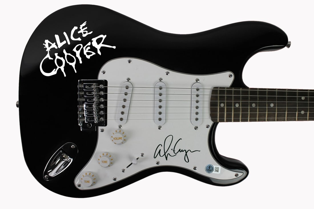 Beckett Witnessed Alice Cooper Signed Black Electric Guitar with Decal: Beckett Witnessed Alice Cooper Signed Black Electric Guitar with Decal Authentic black electric guitar with decal, personally signed by Alice Cooper. This original autographed piece includes Beckett a