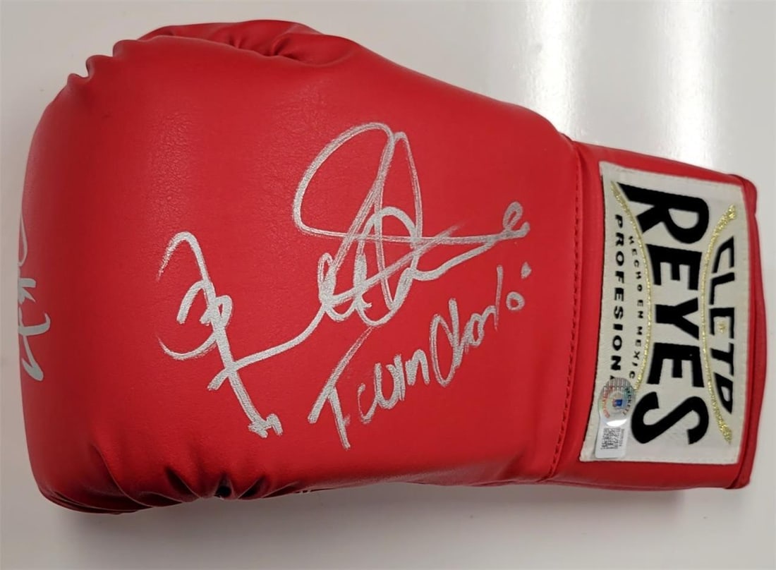 Jermell Charlo Signed Boxing Glove with Beckett Authentication: Jermell Charlo Signed Boxing Glove with Beckett Authentication This boxing glove features the signature of Jermell Charlo, a prominent figure in the sport. Authenticated by Beckett Authentication Serv