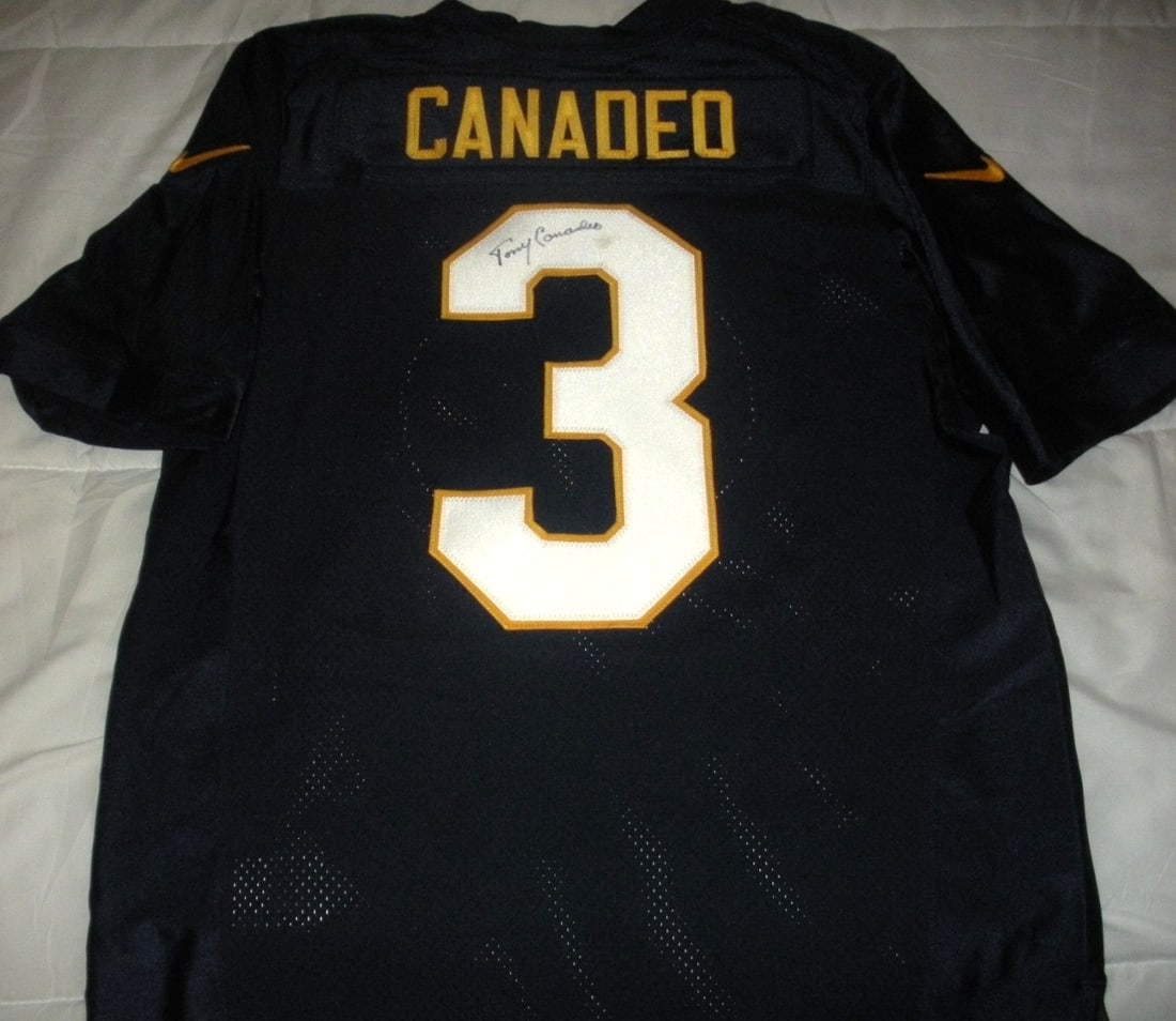 Signed Nike Jersey with COA Featuring Tony Canadeo of Green Bay Packers: Signed Nike Jersey with COA Featuring Tony Canadeo of Green Bay Packers This is an official licensed Nike Green Bay Packers jersey signed by Tony Canadeo. The jersey comes with a certificate of authen