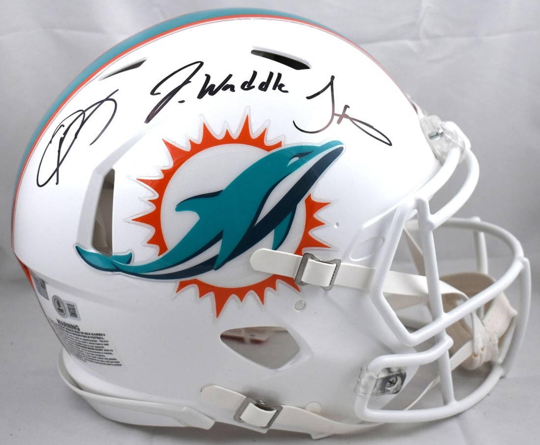 Miami Dolphins Speed Authentic Helmet Signed by Beckham Jr Hill Waddle Beckett W Holo: Miami Dolphins Speed Authentic Helmet Signed by Beckham Jr Hill Waddle Beckett W Holo This Miami Dolphins full-size Speed Authentic helmet has been signed by Odell Beckham Jr., Tyreek Hill, and Jaylen