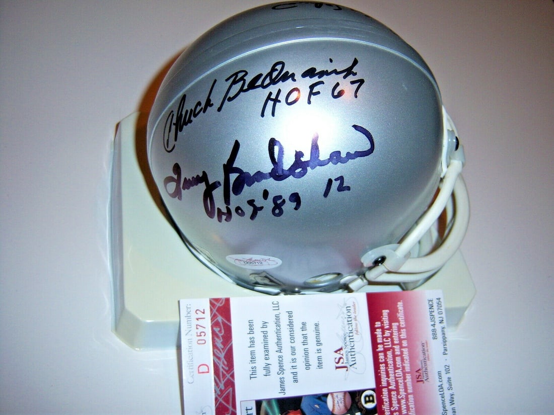 Signed NFL Mini Helmet with Bradshaw Fouts Selmon Bednarik JSA COA: Signed NFL Mini Helmet with Bradshaw Fouts Selmon Bednarik JSA COA This is a pre-owned, original NFL mini helmet signed by Terry Bradshaw, Dan Fouts, Lee Roy Selmon, Chuck Bednarik, and one additional