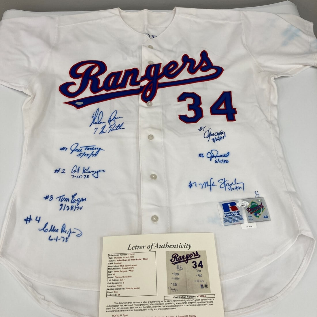 Nolan Ryan Signed Jersey with No-Hitter Catcher Signatures JSA COA #6/7: Nolan Ryan Signed Jersey with No-Hitter Catcher Signatures JSA COA #6/7 This exceptional item is a Nolan Ryan Texas Rangers jersey, boldly signed by the legendary pitcher in blue Sharpie. This jersey 