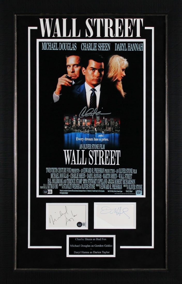 Framed Wall Street Photo Signed by Sheen Douglas and Hannah with Beckett LOA: Framed Wall Street Photo Signed by Sheen Douglas and Hannah with Beckett LOA This framed display features an original photograph from the film Wall Street, personally signed by Charlie Sheen, Michael 