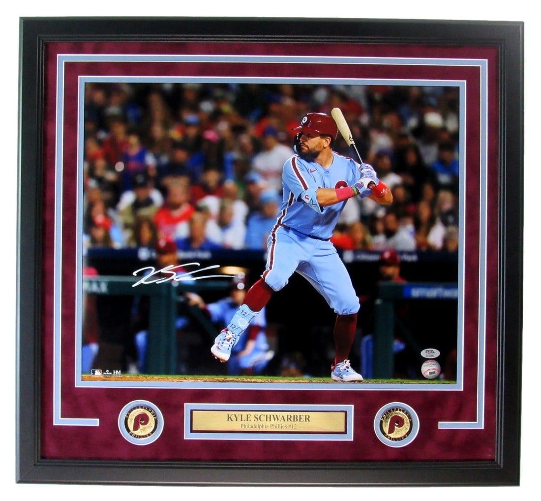 Framed 16x20 Signed Kyle Schwarber Phillies Photo PSA DNA: Framed 16x20 Signed Kyle Schwarber Phillies Photo PSA DNA Framed original 16x20 photo signed by Kyle Schwarber and featuring the Philadelphia Phillies. This baseball collectible is authenticated by PS