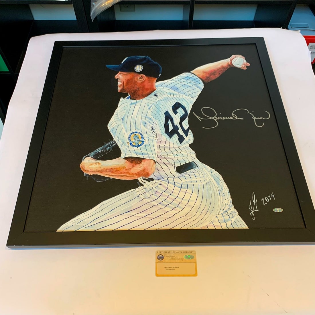 Mariano Rivera Autographed 26x26 Original Painting With Steiner Sports COA: Mariano Rivera Autographed 26x26 Original Painting With Steiner Sports COA This is a large original painting measuring 26x26 inches, featuring Mariano Rivera of the New York Yankees. The artwork is ha
