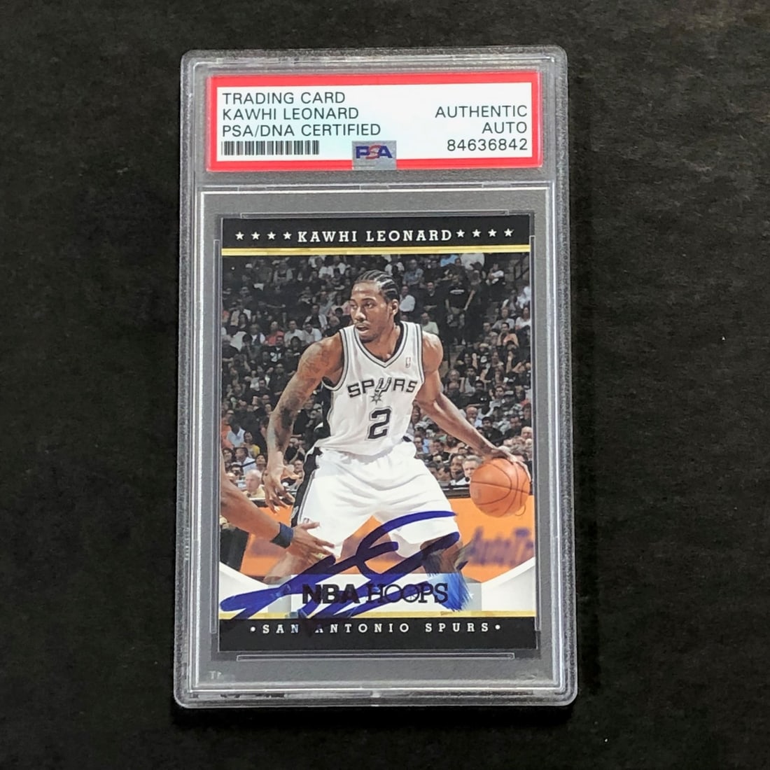 Signed Kawhi Leonard 2012 Panini Hoops Rookie Card 236 PSA DNA Spurs: Signed Kawhi Leonard 2012 Panini Hoops Rookie Card 236 PSA DNA Spurs 2012 Panini Hoops Rookie card #236 signed by Kawhi Leonard. The autograph is PSA authenticated and the card is encapsulated in a PS