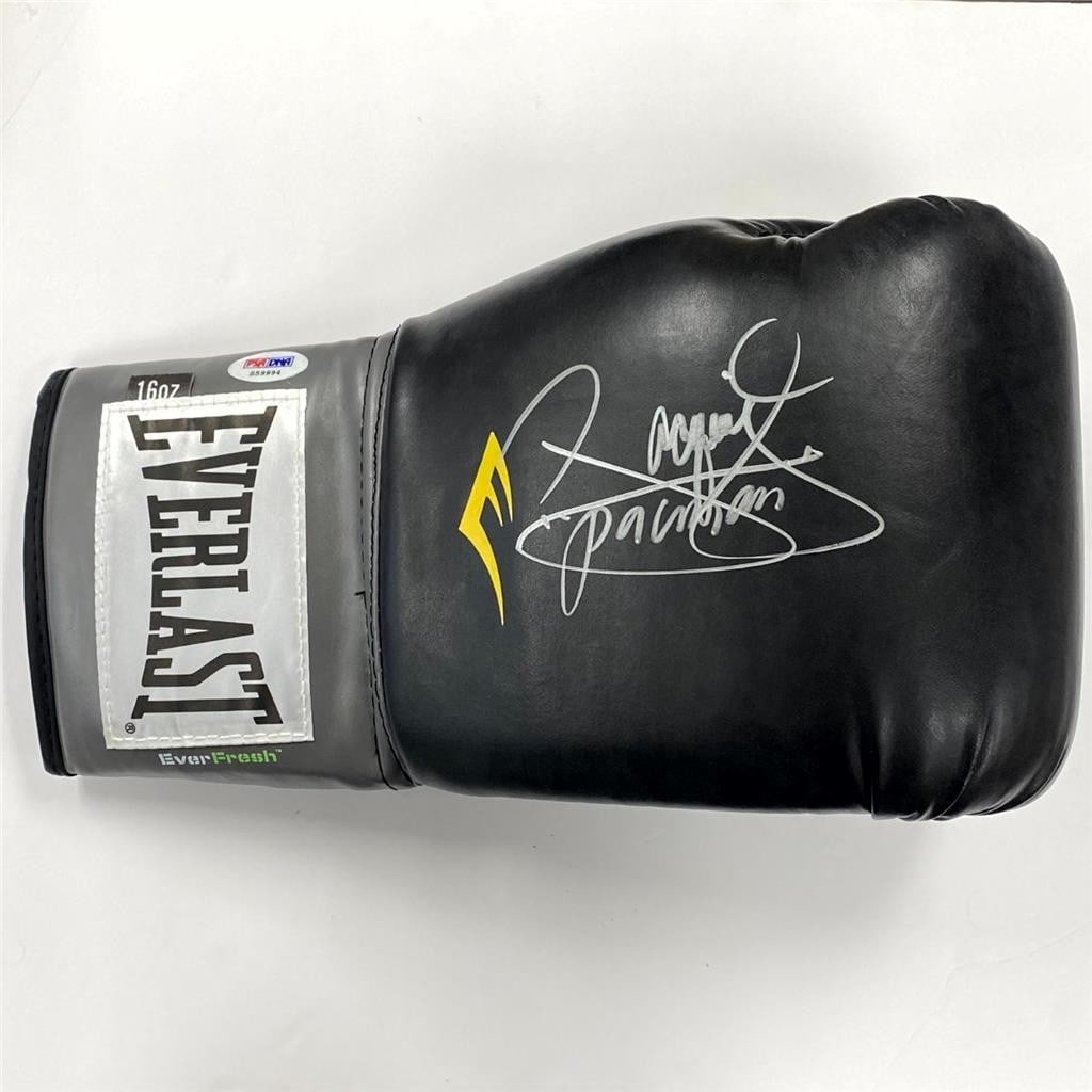 Manny Pacquiao autographed Everlast black boxing glove PSA: Manny Pacquiao autographed Everlast black boxing glove PSA This is a black Everlast boxing glove autographed by Manny Pacquiao, also known as "Pacman." The glove is authenticated by Professional Sport