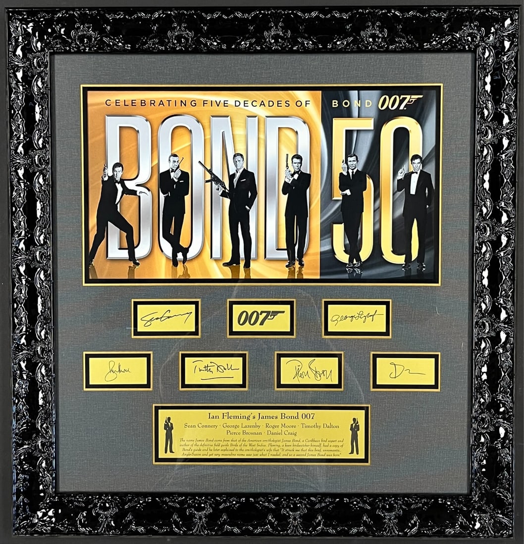 James Bond 50 Year Laser Engraved Signed Display Custom Framed - Reproduction: James Bond 50 Year Laser Engraved Signed Display Custom Framed - Reproduction Celebrate the legacy of the iconic James Bond series with this stunning Laser Engraved Signature Series display. This cust