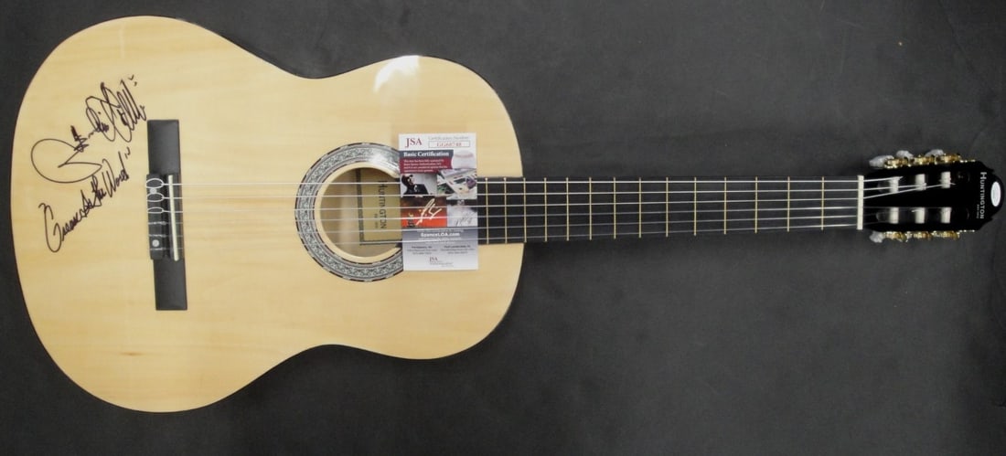 Robert Kool Bell Signed Acoustic Guitar Kool & The Gang JSA Authenticated: Robert Kool Bell Signed Acoustic Guitar Kool & The Gang JSA Authenticated This authentic acoustic guitar features the signature of Robert Kool Bell from the legendary band Kool & The Gang. The autogra