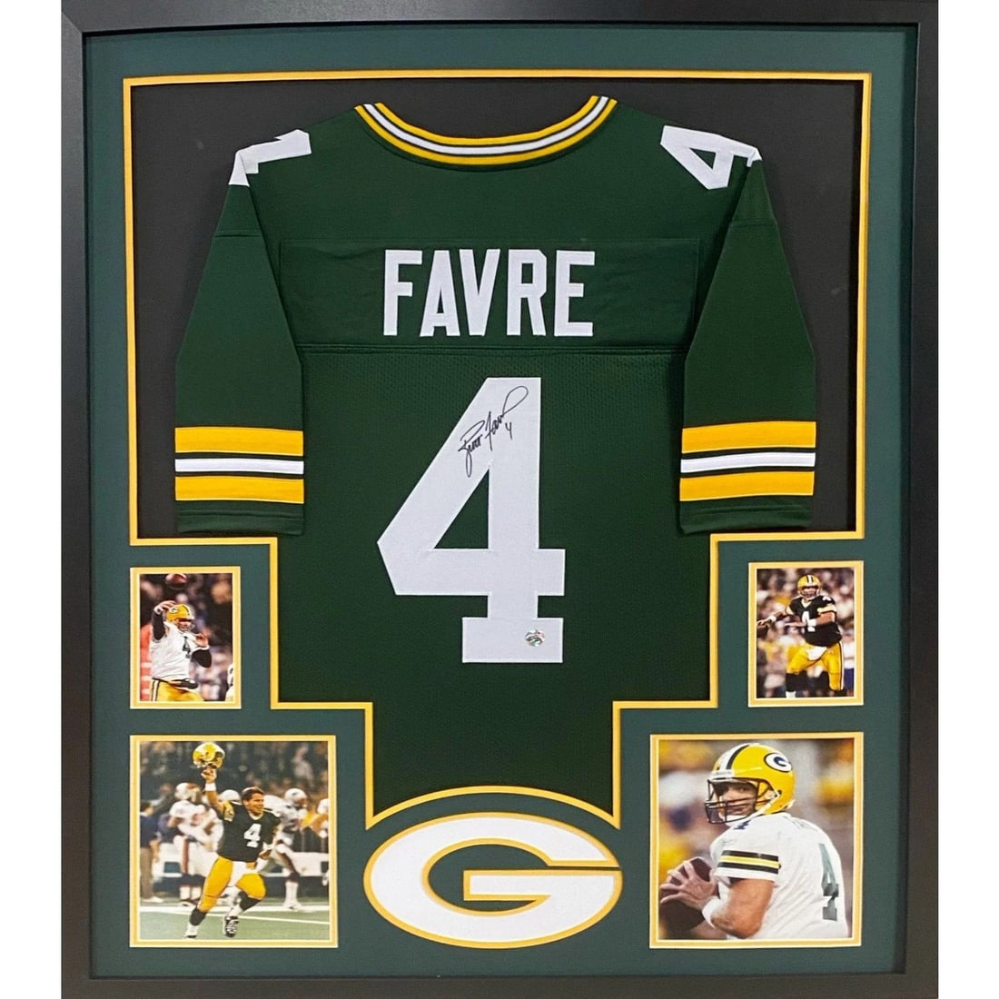 Framed Brett Favre autographed Packers jersey COA 42x34: Framed Brett Favre autographed Packers jersey COA 42x34 This is a framed Green Bay Packers jersey autographed by Brett Favre. The jersey features a tamper-proof sticker for authenticity and is present