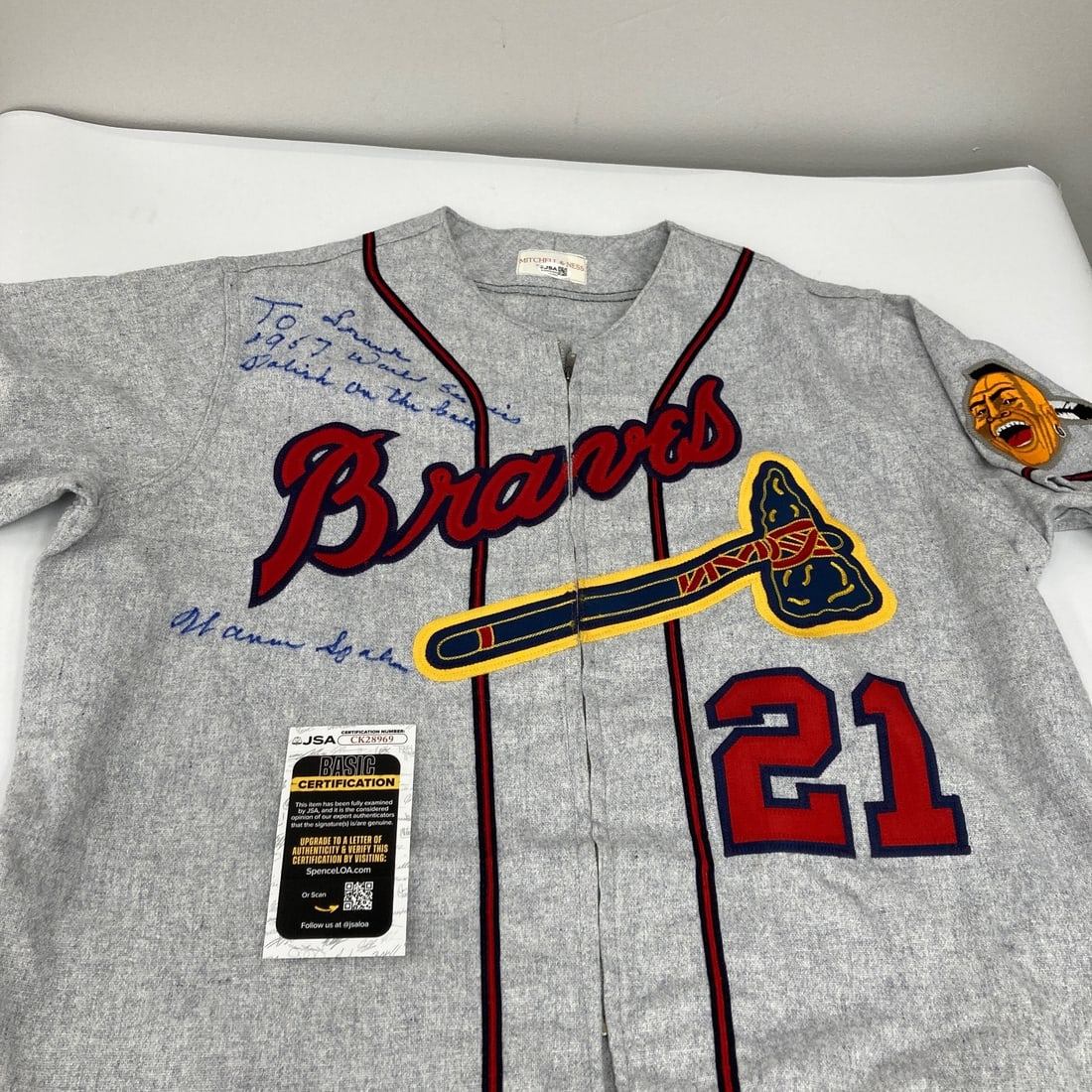 Warren Spahn autographed Milwaukee Braves Mitchell Ness jersey JSA COA: Warren Spahn autographed Milwaukee Braves Mitchell Ness jersey JSA COA This is a pre-owned Milwaukee Braves Mitchell & Ness jersey signed and inscribed by Warren Spahn with "1957 World Series, Polish 