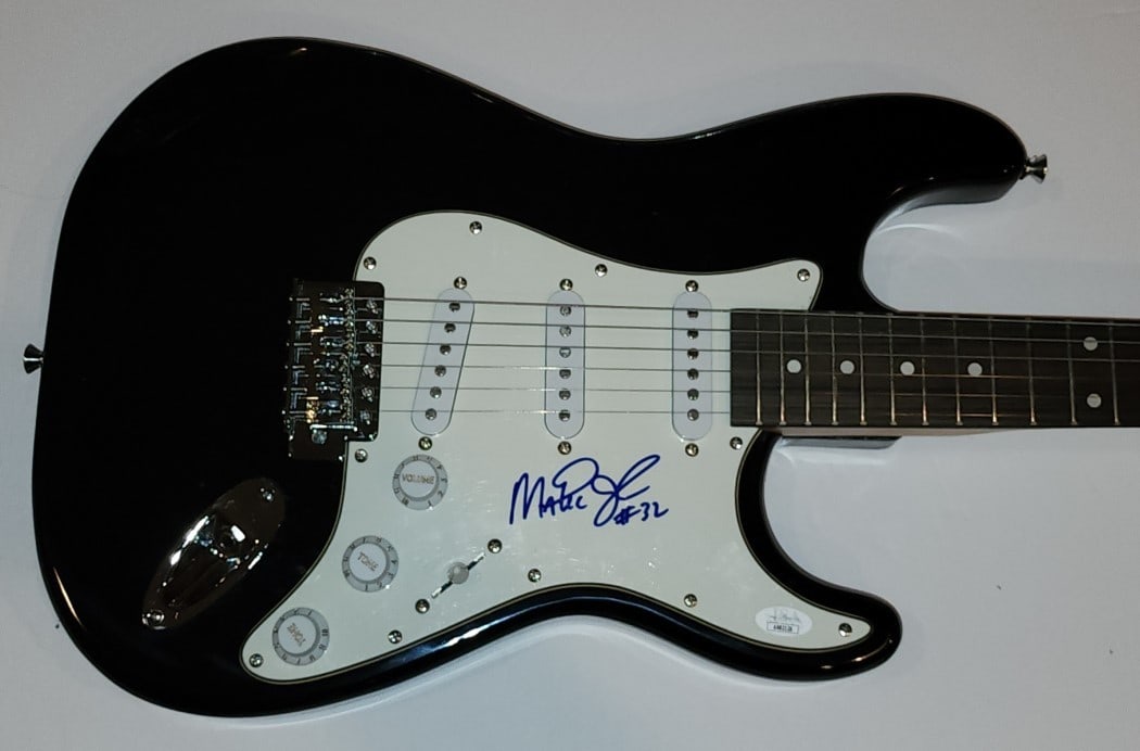 Electric Guitar Signed by Magic Johnson Los Angeles Lakers JSA Authenticated: Electric Guitar Signed by Magic Johnson Los Angeles Lakers JSA Authenticated This electric guitar is personally signed by Magic Johnson, the legendary Hall of Famer from the Los Angeles Lakers. The au