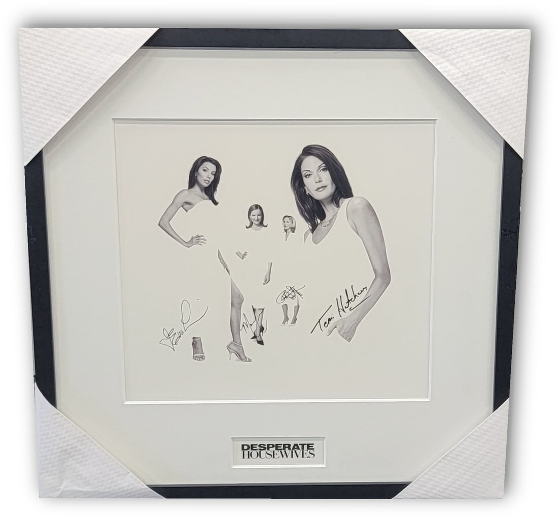 Desperate Housewives Autographed Photo by Eva Longoria Felicity Huffman JSA Authenticated: Desperate Housewives Autographed Photo by Eva Longoria Felicity Huffman JSA Authenticated This stunning framed photograph features the beloved cast of "Desperate Housewives," including autographs from