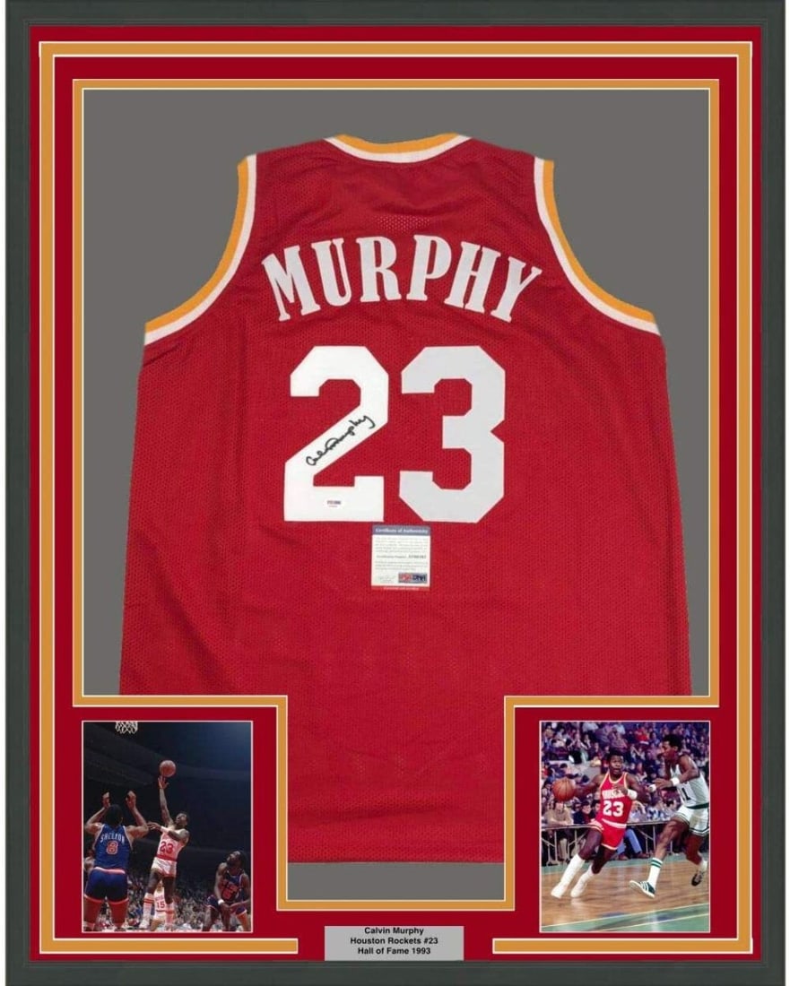 Framed Calvin Murphy Signed Houston Rockets Red Jersey PSA DNA COA: Framed Calvin Murphy Signed Houston Rockets Red Jersey PSA DNA COA This framed Houston Rockets red jersey features the authentic autograph of NBA legend Calvin Murphy. The jersey measures 33x42 inches