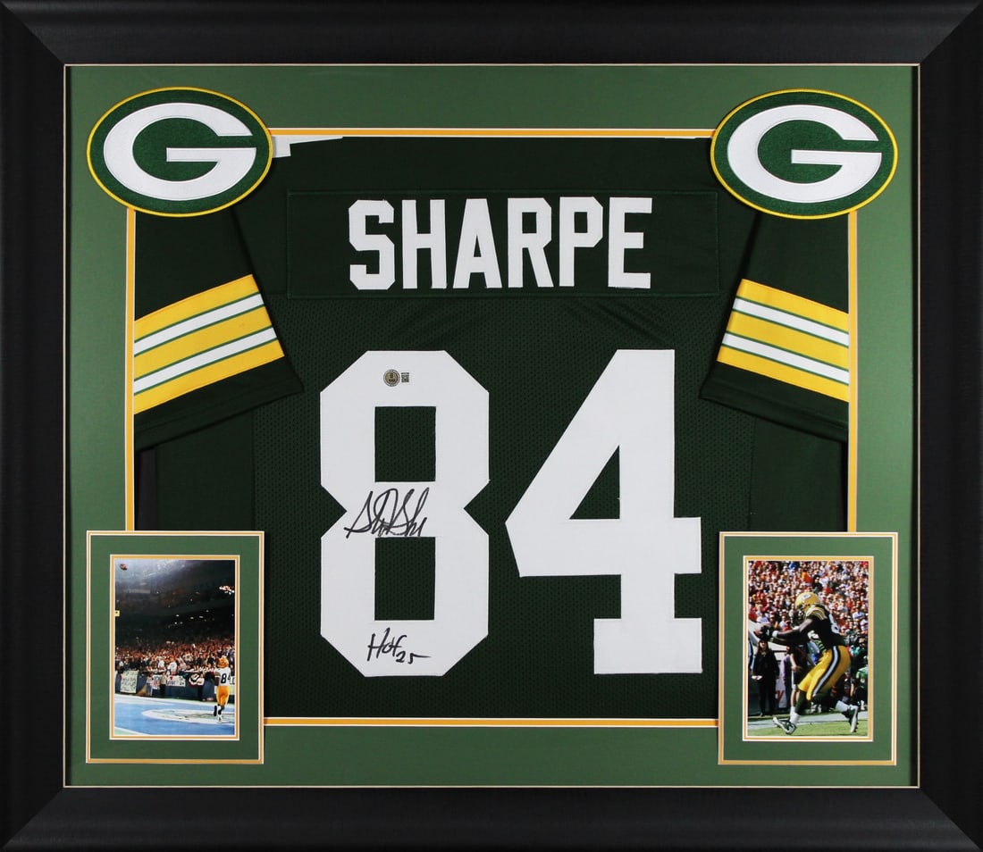 Framed Green Jersey Signed by Sterling Sharpe with HOF 25 Inscription BAS Authenticated: Framed Green Jersey Signed by Sterling Sharpe with HOF 25 Inscription BAS Authenticated This professionally framed green pro style jersey has been personally signed by Sterling Sharpe of the Green Bay