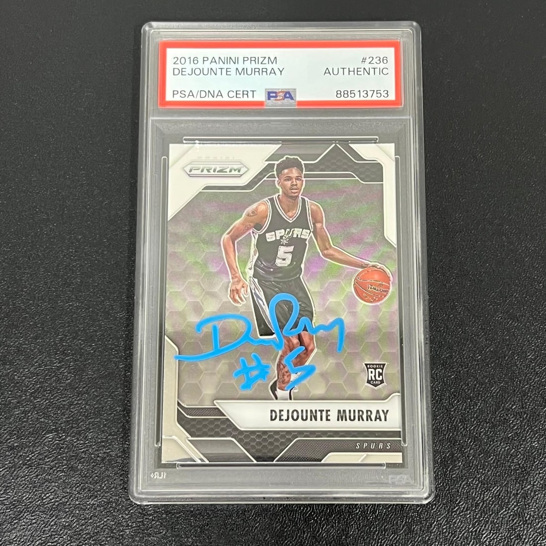 2016-17 Panini Prizm #236 Dejounte Murray Signed PSA/DNA Spurs Card: 2016-17 Panini Prizm #236 Dejounte Murray Signed PSA/DNA Spurs Card This is a 2016-17 Panini Prizm #236 sports trading card featuring the autograph of Dejounte Murray, who played for the San Antonio S