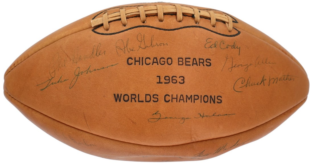 1965 Chicago Bears Team-Signed Football with George Halas and Brian Piccolo Beckett COA: 1965 Chicago Bears Team-Signed Football with George Halas and Brian Piccolo Beckett COA This is a Chicago Bears football signed by 38 members of the iconic 1965 team, featuring signatures in green, bl