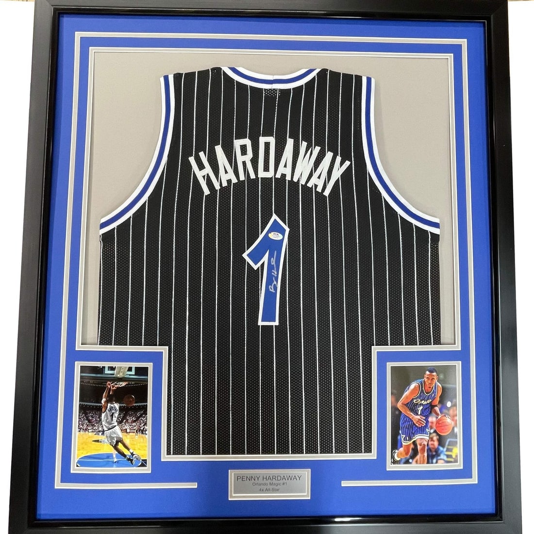 Framed Autographed Penny Hardaway Black Jersey PSA/DNA COA 33x42: Framed Autographed Penny Hardaway Black Jersey PSA/DNA COA 33x42 Celebrate your love for basketball with this professionally framed and autographed Anfernee "Penny" Hardaway jersey. Measuring 33"x42",