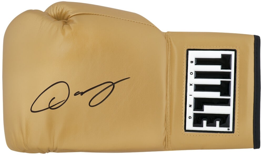Oscar De La Hoya Signed Title Boxing Glove with COA: Oscar De La Hoya Signed Title Boxing Glove with COA This is an original signed boxing glove by Oscar De La Hoya, a renowned boxing champion. The glove features a striking gold color and comes with a t