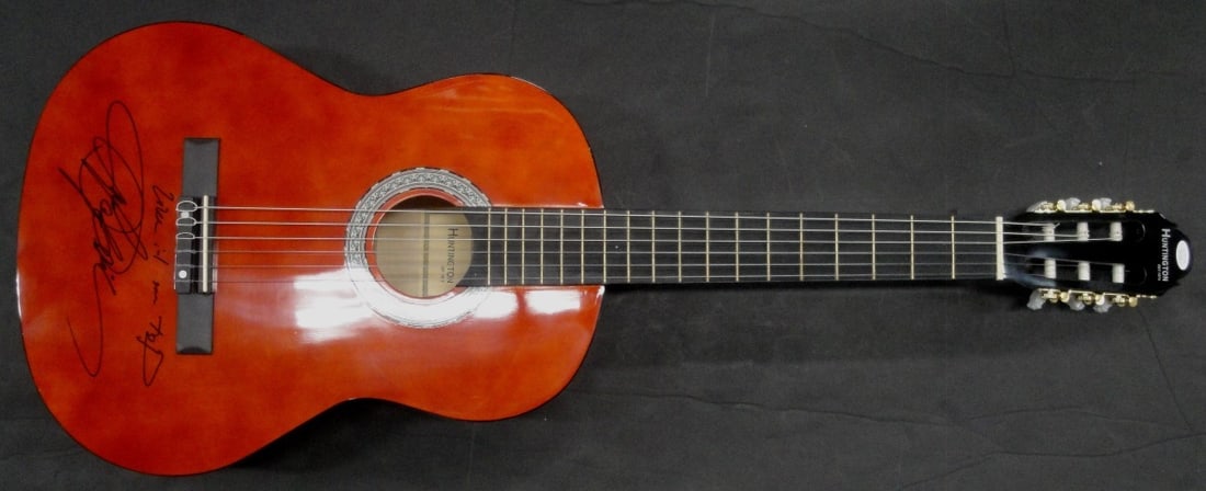 Autographed Acoustic Guitar Signed by Anna Popovic with JSA Authentication: Autographed Acoustic Guitar Signed by Anna Popovic with JSA Authentication This is an original acoustic guitar autographed by blues legend Anna Popovic. The signature has been authenticated by James S