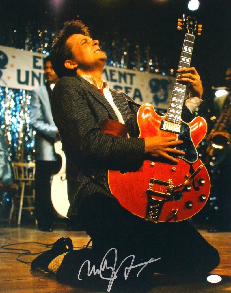 JSA Certified Michael J. Fox Back to the Future 16x20 Signed Photo: JSA Certified Michael J. Fox Back to the Future 16x20 Signed Photo This 16x20 photograph features Michael J. Fox and is signed by the actor. The autograph is authenticated by JSA. The photo is from th