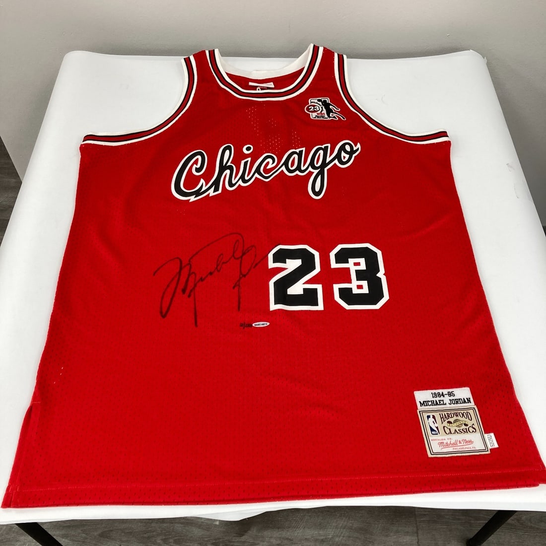 Autographed 1984-85 Chicago Bulls Jersey Michael Jordan UDA PSA Beckett Authenticated: Autographed 1984-85 Chicago Bulls Jersey Michael Jordan UDA PSA Beckett Authenticated This is an authentic Mitchell & Ness Chicago Bulls retro jersey representing Michael Jordan's 1984-85 rookie seaso