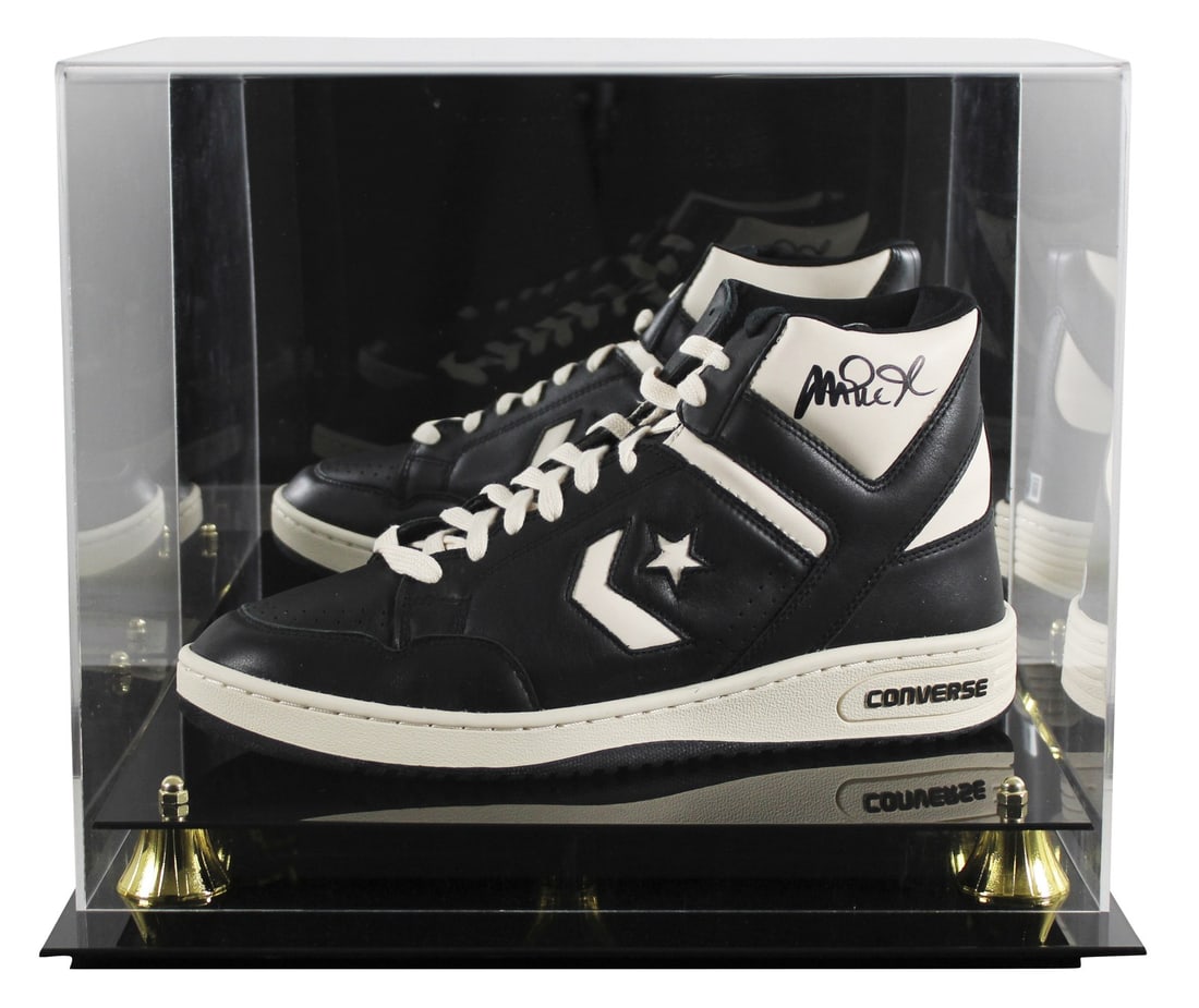 Magic Johnson Signed Left Converse Weapon Shoe with Display Case BAS Authenticated: Magic Johnson Signed Left Converse Weapon Shoe with Display Case BAS Authenticated This autographed left black and white Converse Weapon shoe is a remarkable piece of sports memorabilia, personally si