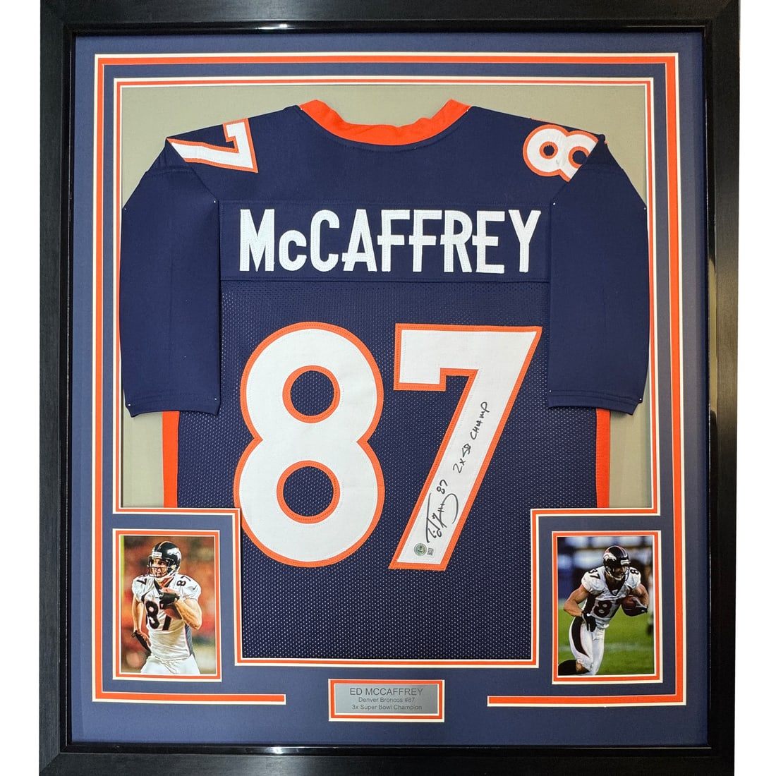 Ed McCaffrey Signed Framed Broncos Blue Jersey 35x39 BAS COA: Ed McCaffrey Signed Framed Broncos Blue Jersey 35x39 BAS COA This framed Ed McCaffrey blue jersey commemorates his achievement as a 2-time Super Bowl champion with the Denver Broncos. The jersey is au