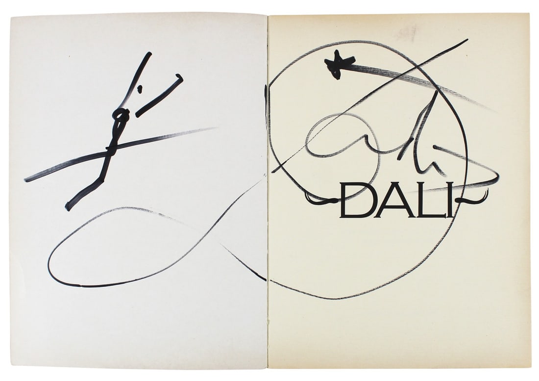 Salvador Dali Signed First Printing Book with Sketch JSA Certified: Salvador Dali Signed First Printing Book with Sketch JSA Certified This authentic Salvador Dali first printing softcover book features a two-page signature and an original sketch by the legendary arti