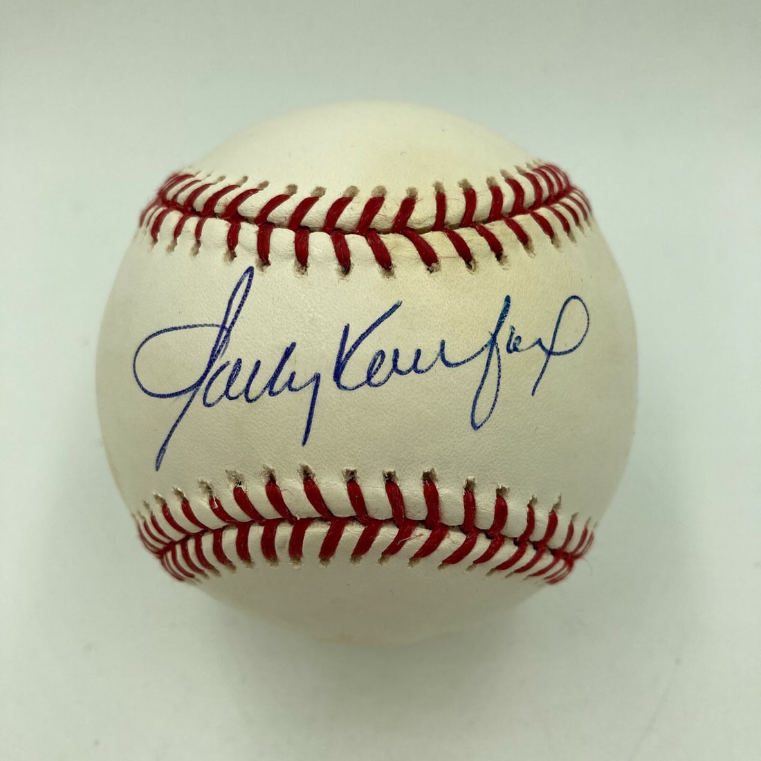 Sandy Koufax Autographed MLB Baseball with Steiner COA: Sandy Koufax Autographed MLB Baseball with Steiner COA This Official Major League Baseball is autographed by Sandy Koufax, a legendary player of the Los Angeles Dodgers. The signature is authenticated