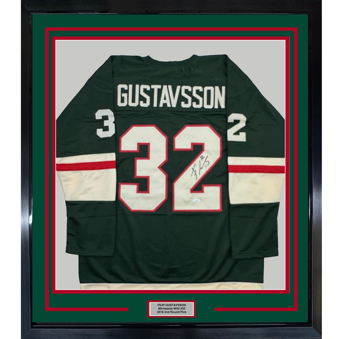 Framed Filip Gustavsson Signed Minnesota Wild Jersey with JSA COA: Framed Filip Gustavsson Signed Minnesota Wild Jersey with JSA COA This is a professionally framed and matted autographed jersey of Filip Gustavsson, featuring the Minnesota Wild. The framed display me