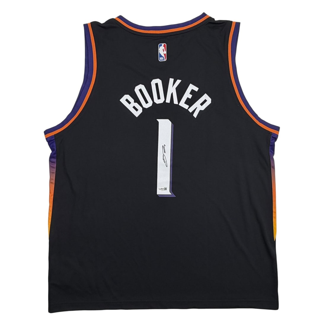 Devin Booker Signed Black Phoenix Suns Authentic Jersey JSA COA: Devin Booker Signed Black Phoenix Suns Authentic Jersey JSA COA This pre-owned Phoenix Suns black authentic jersey has been personally autographed by Devin Booker. The signature is authenticated by Ja