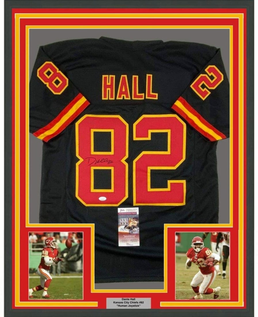 Framed Dante Hall Signed Kansas City Chiefs Jersey 33x42 JSA COA: Framed Dante Hall Signed Kansas City Chiefs Jersey 33x42 JSA COA Professionally framed and matted autographed Dante Hall Kansas City black jersey. This original signed football collectible includes tw