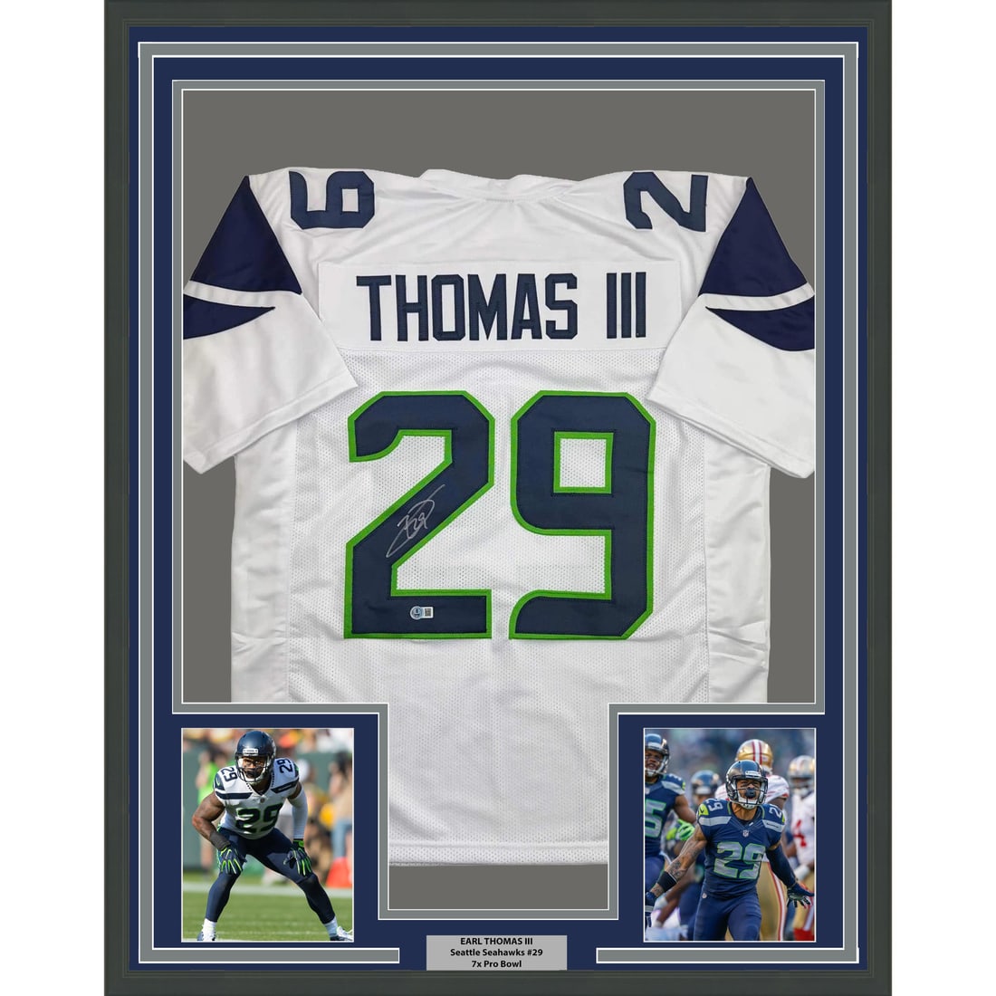 Earl Thomas III Signed Framed Seattle Jersey with Beckett COA 35x39: Earl Thomas III Signed Framed Seattle Jersey with Beckett COA 35x39 This professionally framed and matted display features a Seattle Seahawks white jersey autographed by Earl Thomas III. The jersey co
