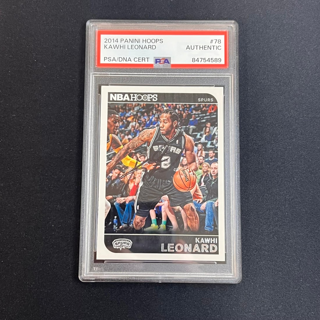 PSA Kawhi Leonard signed Panini Hoops #78 Spurs card: PSA Kawhi Leonard signed Panini Hoops #78 Spurs card Autographed basketball trading card featuring Kawhi Leonard of the San Antonio Spurs. The card is from Panini Hoops, card number 78, and includes P