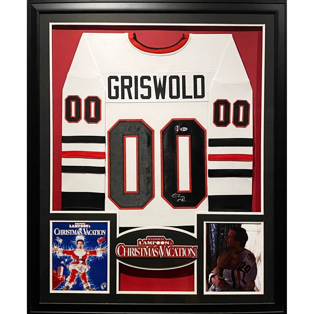 Framed Clark Griswold Jersey Signed by Chevy Chase Beckett COA Christmas Vacation: Framed Clark Griswold Jersey Signed by Chevy Chase Beckett COA Christmas Vacation This framed jersey is autographed by Chevy Chase in his role as Griswold from Christmas Vacation. The jersey is authen