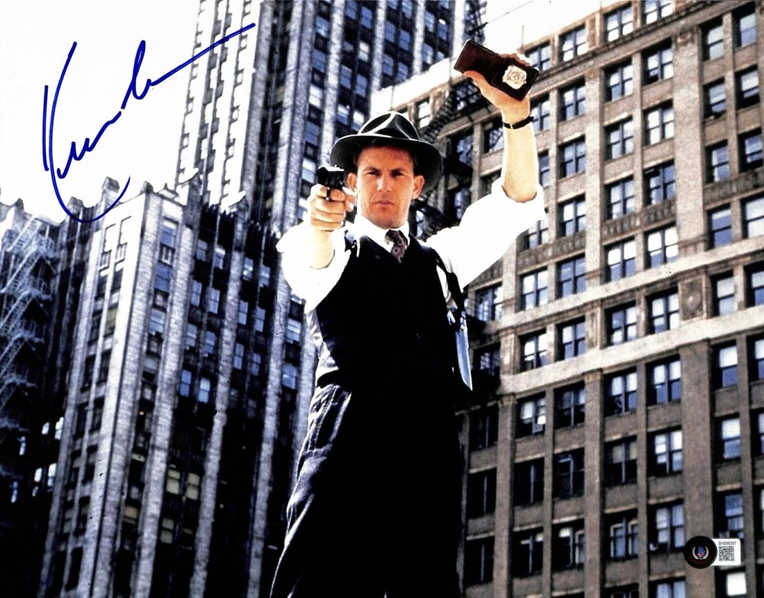Kevin Costner Signed 11x14 Photo from Untouchables BECKETT Certified: Kevin Costner Signed 11x14 Photo from Untouchables BECKETT Certified This stunning 11x14 photograph features Kevin Costner as Eliot Ness from the classic film "The Untouchables," skillfully autographe