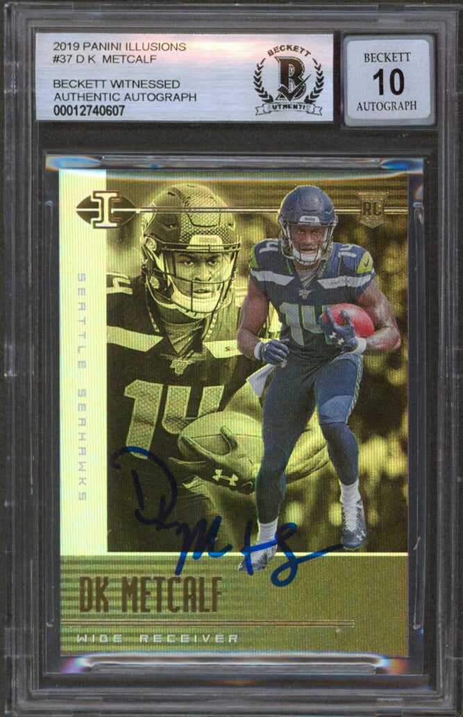 D.K. Metcalf Signed 2019 Panini Illusions RC Card Auto 10 Beckett Authenticated: D.K. Metcalf Signed 2019 Panini Illusions RC Card Auto 10 Beckett Authenticated This remarkable 2019 Panini Illusions #37 Rookie Card features the autograph of D.K. Metcalf, a standout player for the 