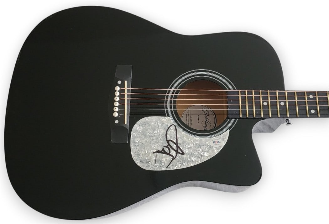 Acoustic Guitar Signed by John Mellencamp with PSA DNA Authentication: Acoustic Guitar Signed by John Mellencamp with PSA DNA Authentication This is a pre-owned acoustic guitar and guitar pick autographed by John Mellencamp. The signature has been authenticated by Profes