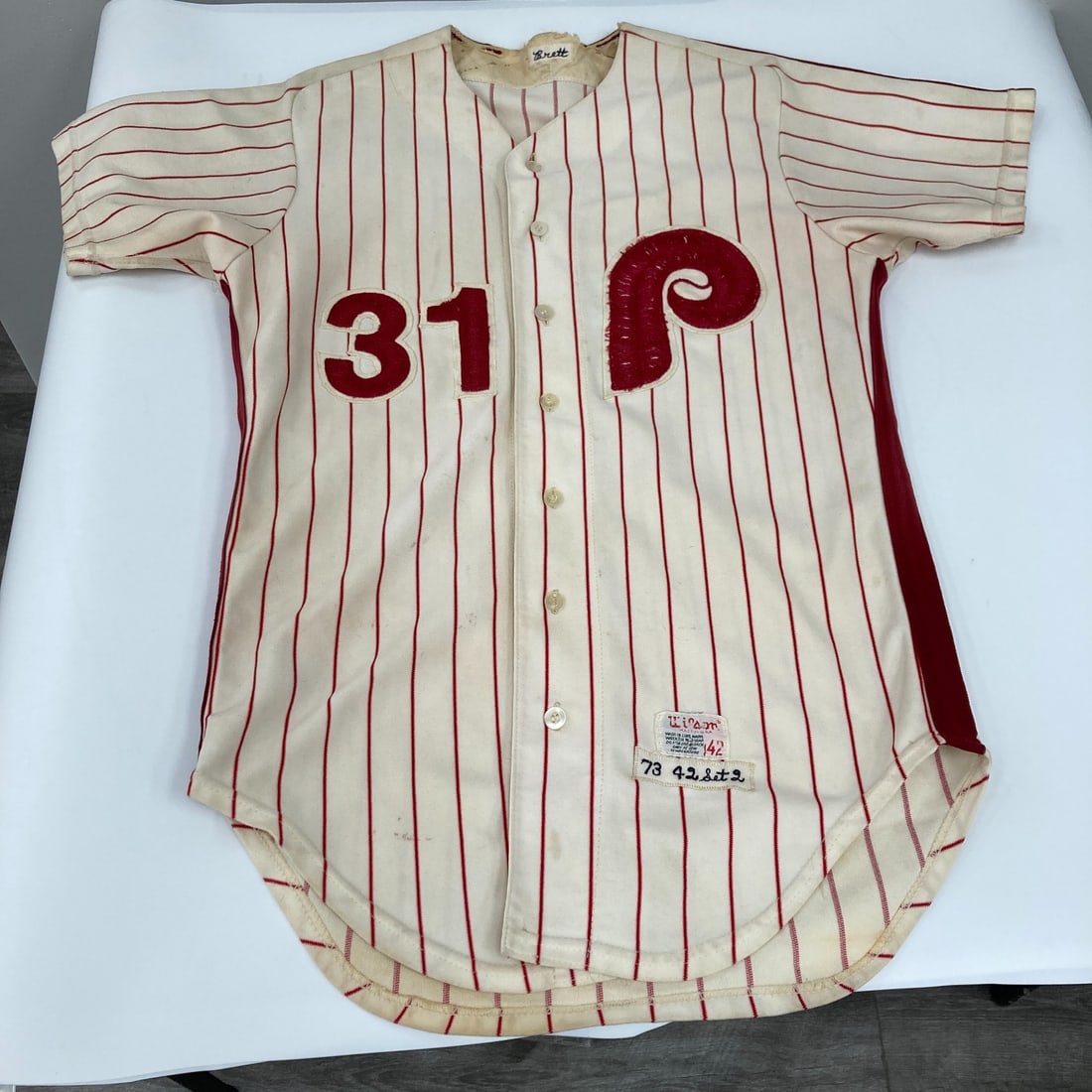 Ken Brett 1973 Game Used Phillies Jersey MEARS A9 COA Provenance: Ken Brett 1973 Game Used Phillies Jersey MEARS A9 COA Provenance This is a Ken Brett 1973 Game Used Philadelphia Phillies Jersey, officially licensed and bearing the MEARS A9 designation. This jersey 