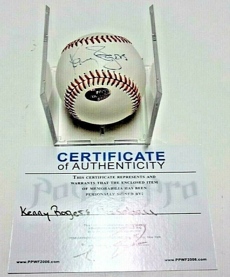 Autographed Baseball by Kenny Rogers With Certificate of Authenticity: Autographed Baseball by Kenny Rogers With Certificate of Authenticity This is an original baseball signed by the renowned country music singer Kenny Rogers. The item is accompanied by a certificate of