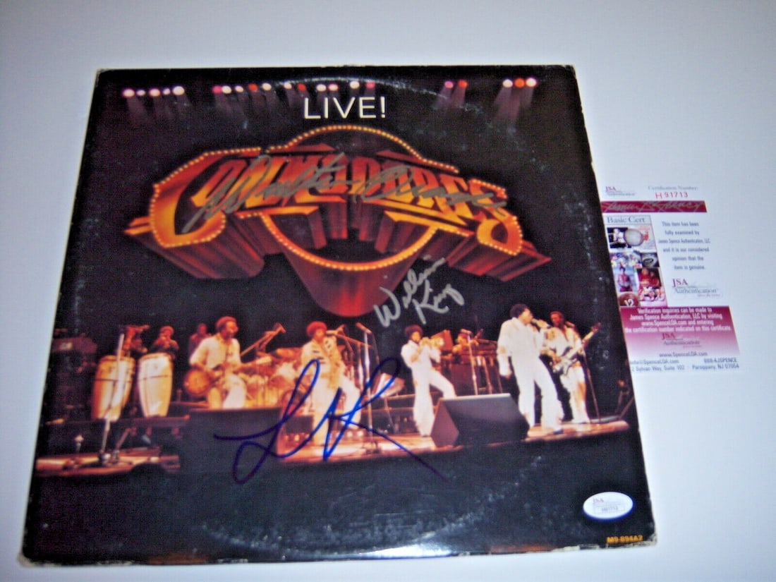 Signed Commodores LP Album With Three Autographs JSA COA: Signed Commodores LP Album With Three Autographs JSA COA This is an original LP record album of The Commodores Live, signed by Lionel Richie and two other signatories. The album comes from the United 