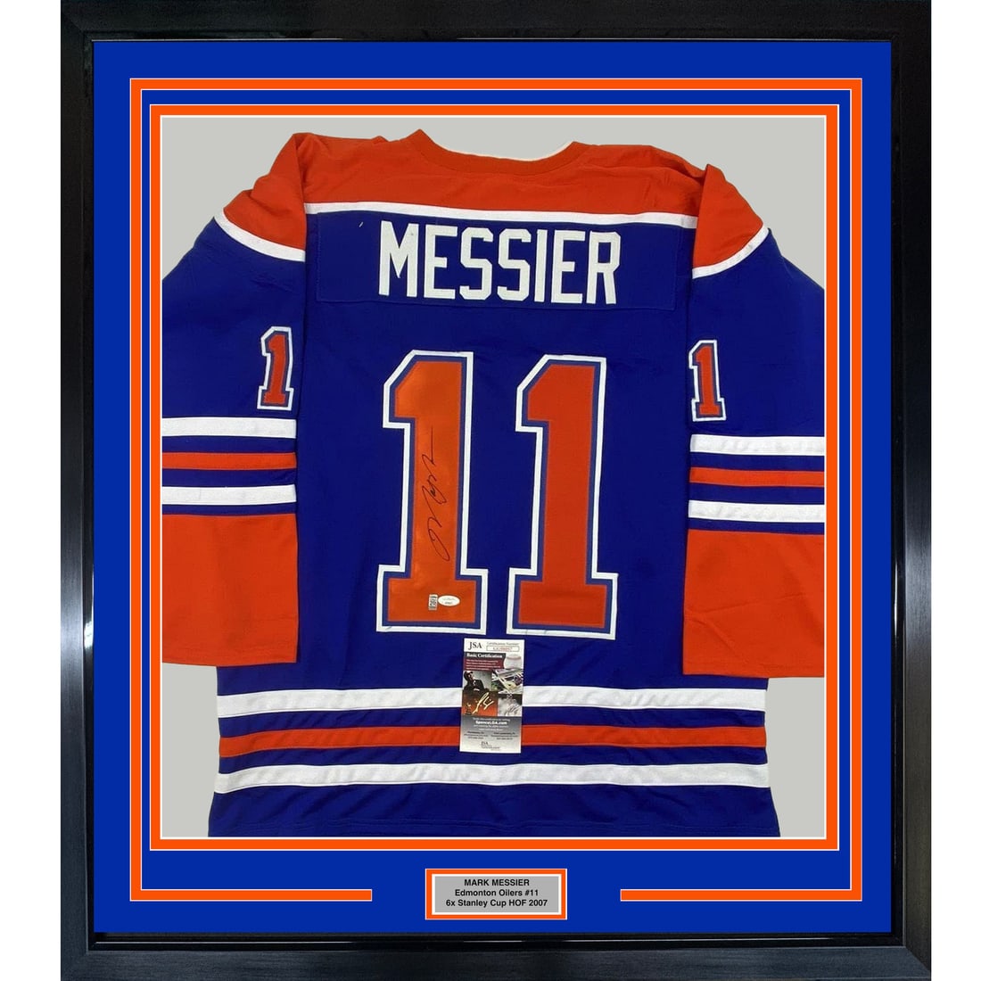 Framed Signed Mark Messier Edmonton Oilers Jersey with JSA COA: Framed Signed Mark Messier Edmonton Oilers Jersey with JSA COA Celebrate a hockey legend with this professionally framed and autographed Mark Messier jersey. This striking Edmonton Oilers blue jersey,