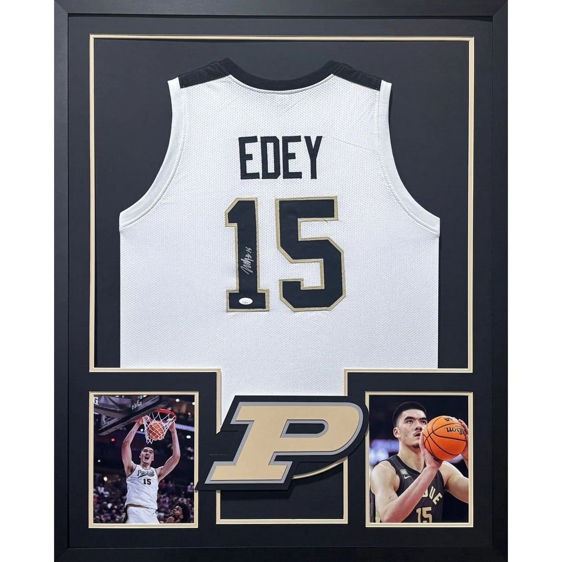 Framed Purdue White Jersey Signed by Zach Edey with JSA Authentication: Framed Purdue White Jersey Signed by Zach Edey with JSA Authentication This framed Purdue white jersey is autographed by Zach Edey and authenticated by JSA, ensuring its authenticity. The jersey is pr
