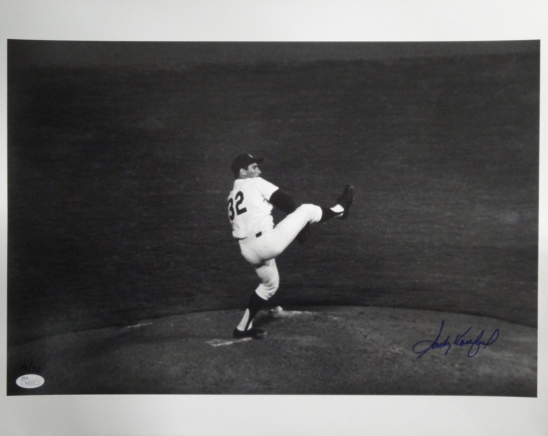 Sandy Koufax Autographed 16x20 Photo Dodgers JSA Authenticated: Sandy Koufax Autographed 16x20 Photo Dodgers JSA Authenticated This is a stunning autographed photo of Sandy Koufax, measuring approximately 16" x 20". The image features Koufax pitching on the mound 