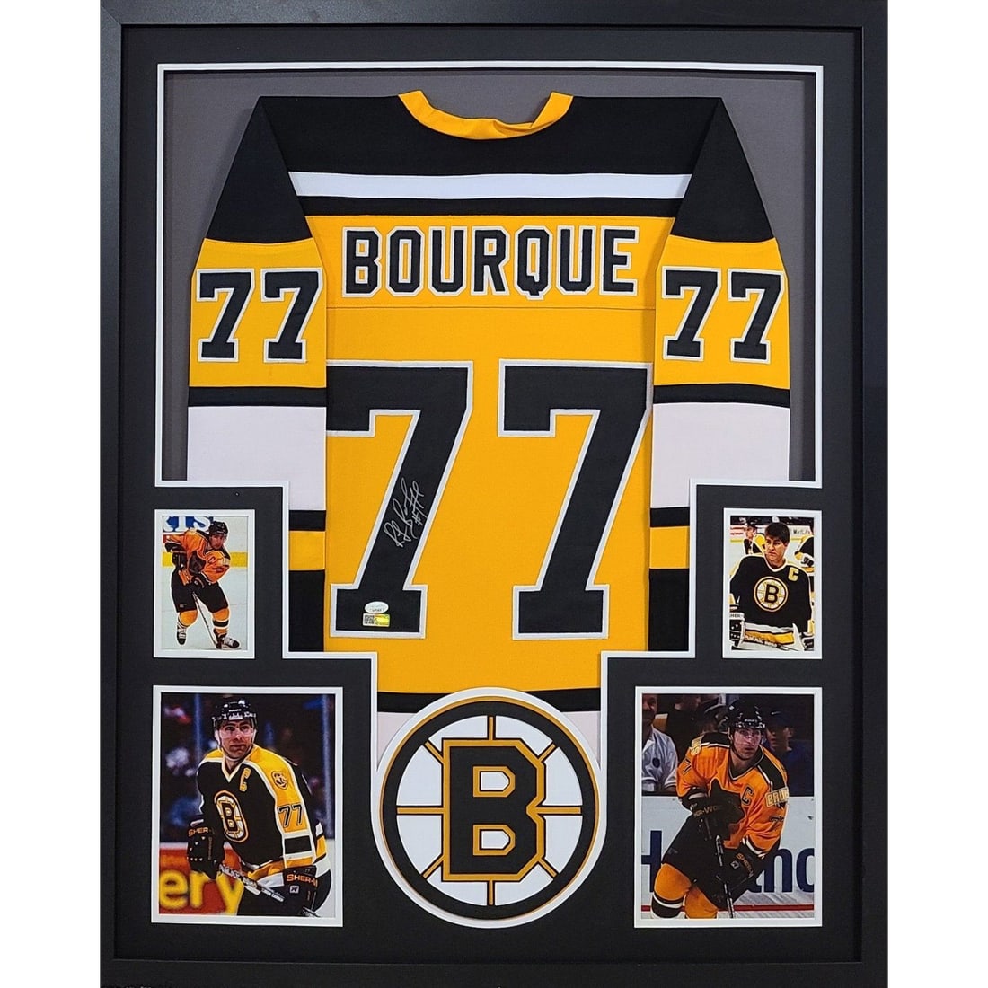 Ray Bourque Autographed Framed Jersey JSA Authentic Boston Bruins: Ray Bourque Autographed Framed Jersey JSA Authentic Boston Bruins This is an autographed Ray Bourque framed jersey, showcasing the legendary player's signature with a high level of detail in the frami
