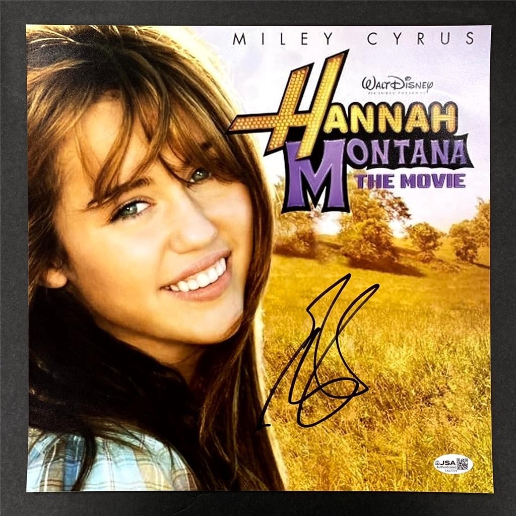 JSA authenticated Miley Cyrus signed Hannah Montana movie photo poster 11x14: JSA authenticated Miley Cyrus signed Hannah Montana movie photo poster 11x14 This is an original 11x14 photograph from the Hannah Montana Movie, signed by Miley Cyrus. The autograph has been authentic