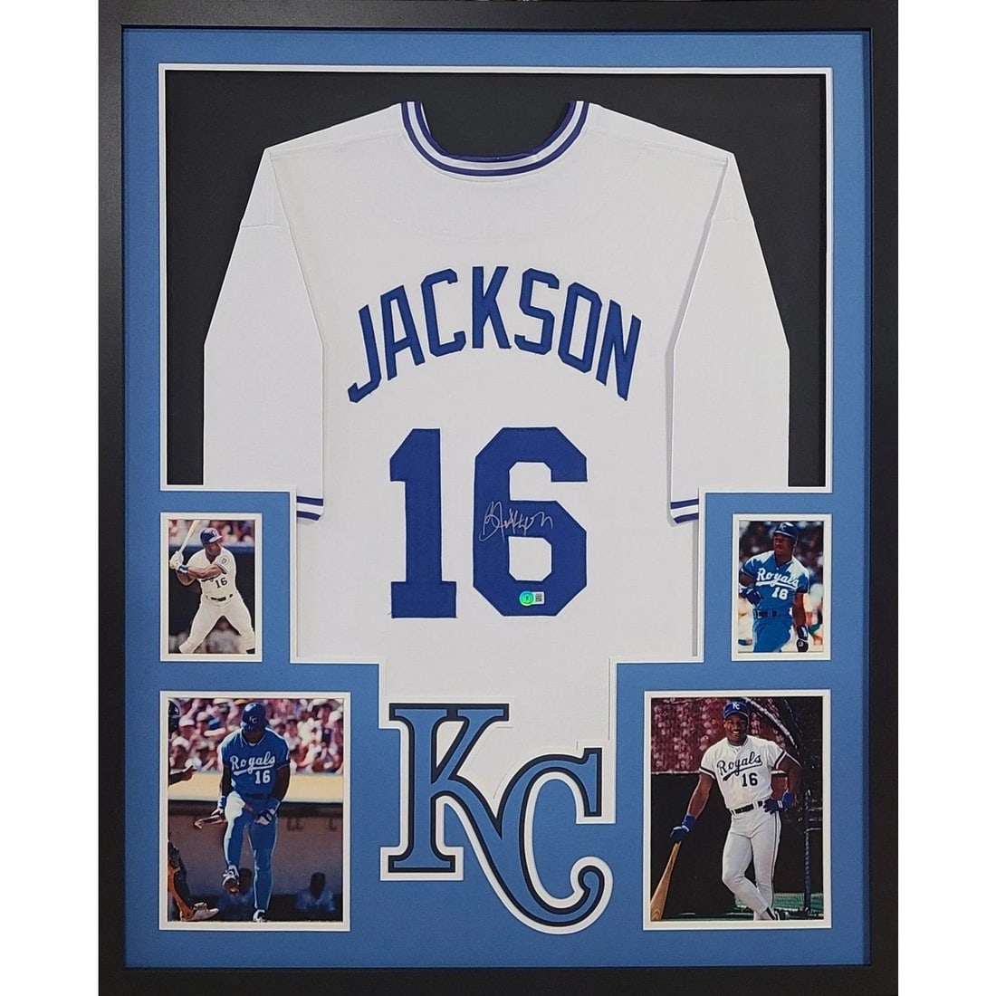 Framed Bo Jackson Autographed Kansas City Royals Jersey Beckett Authenticated: Framed Bo Jackson Autographed Kansas City Royals Jersey Beckett Authenticated This framed white Kansas City Royals jersey features the authentic autograph of Bo Jackson. The jersey is presented in a f